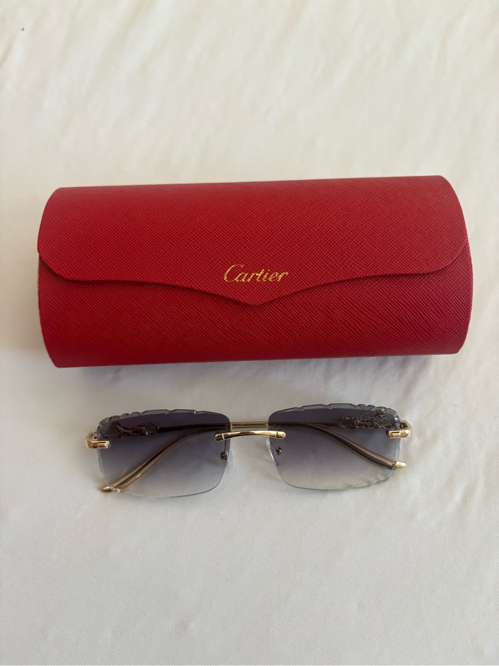 Cartier Rimless Sunglasses With Diamond Cut Magenta Lenses and Gold Frame